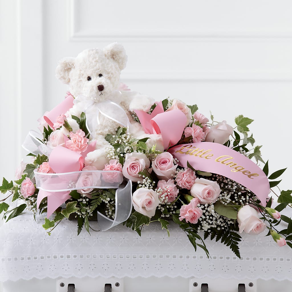 Touch of Sympathy Casket Spray – Floral Expressions, Auburn IL
